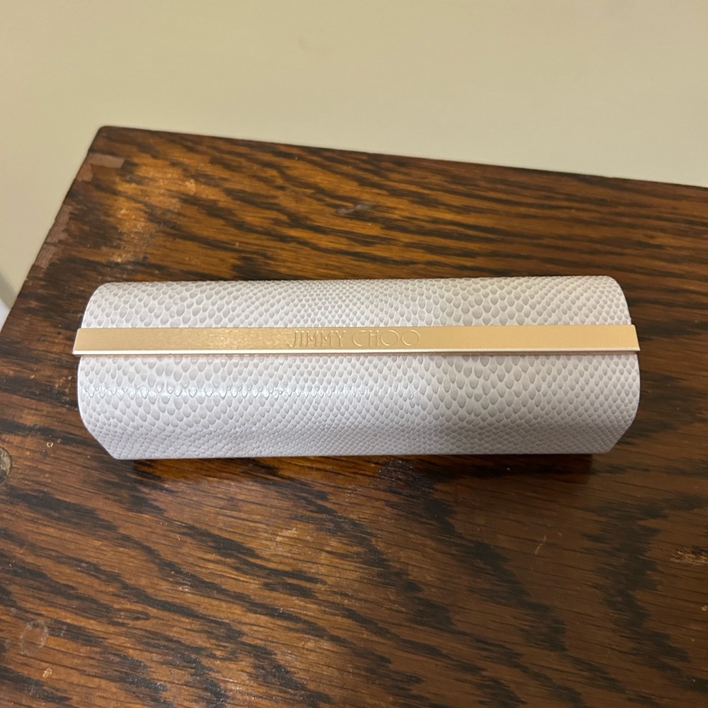 Jimmy Choo Textured White and Gold glasses case but could be used as a Clutch